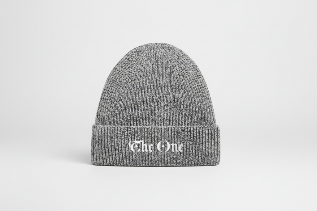 Gray knit beanie with 'The One' text on a white background
