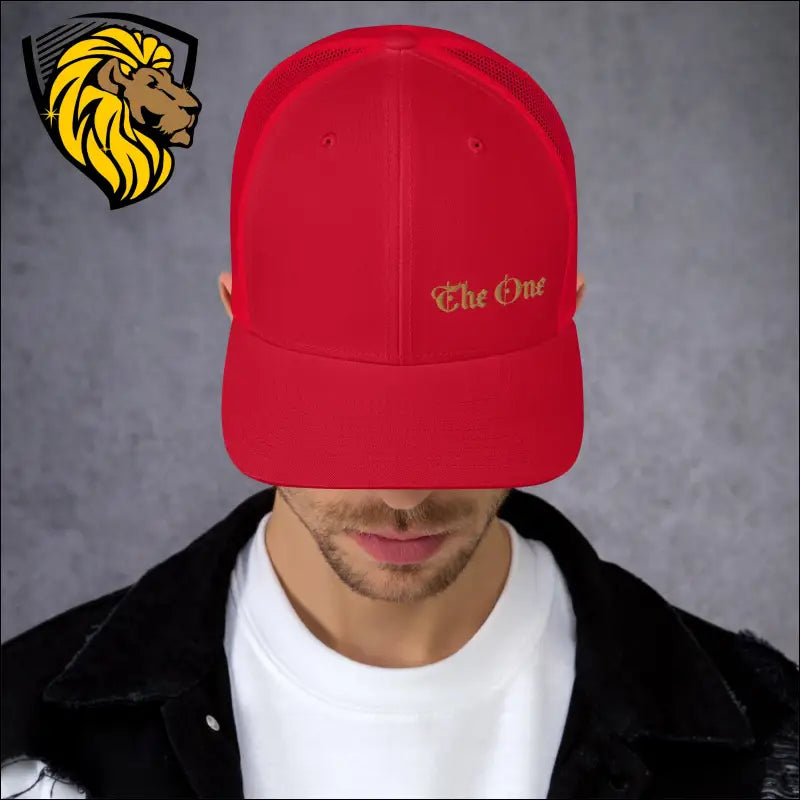 Red baseball cap with gold The One embroidery for a bold trucker cap style