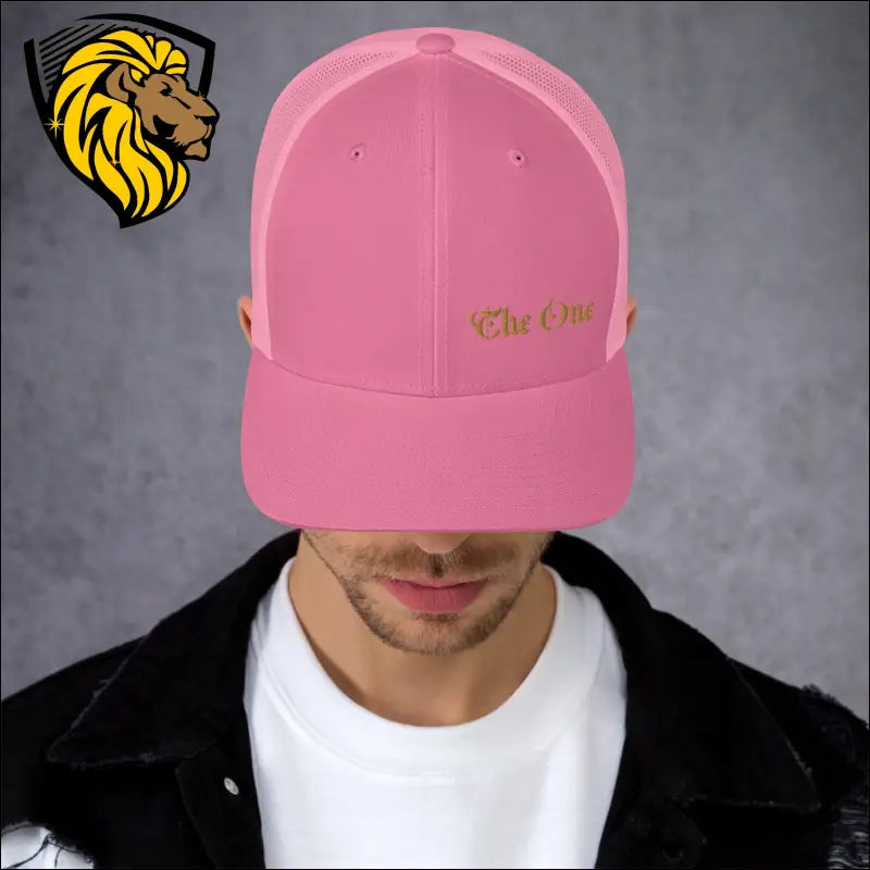 Pink baseball cap with gold The One embroidery for a stylish trucker cap look