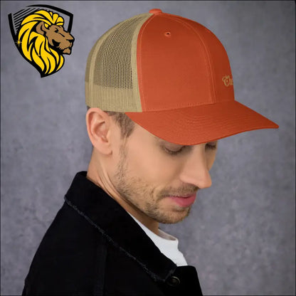 Orange and tan trucker cap showcasing stylish design for a bold look in this gorra