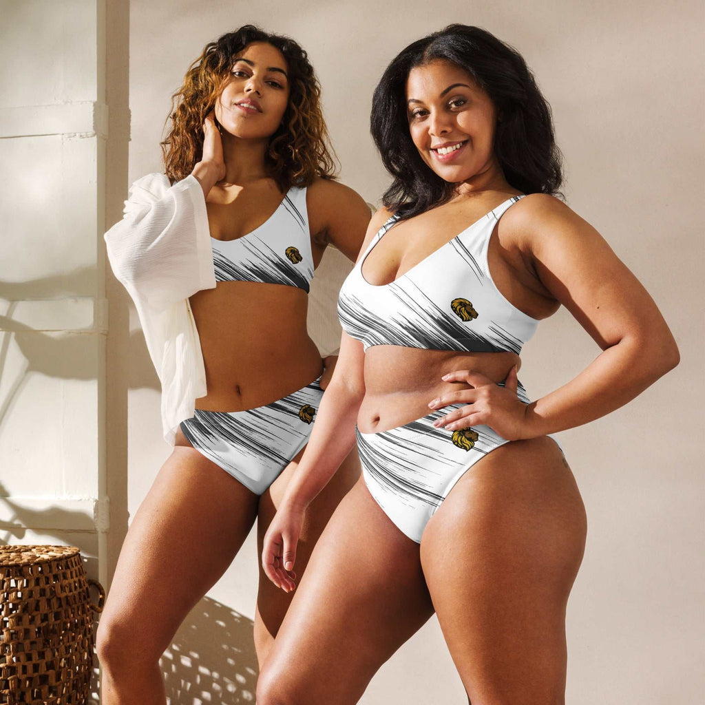 Black and white high-waisted bikini made from sustainable recycled polyester with flattering fit and removable padding.