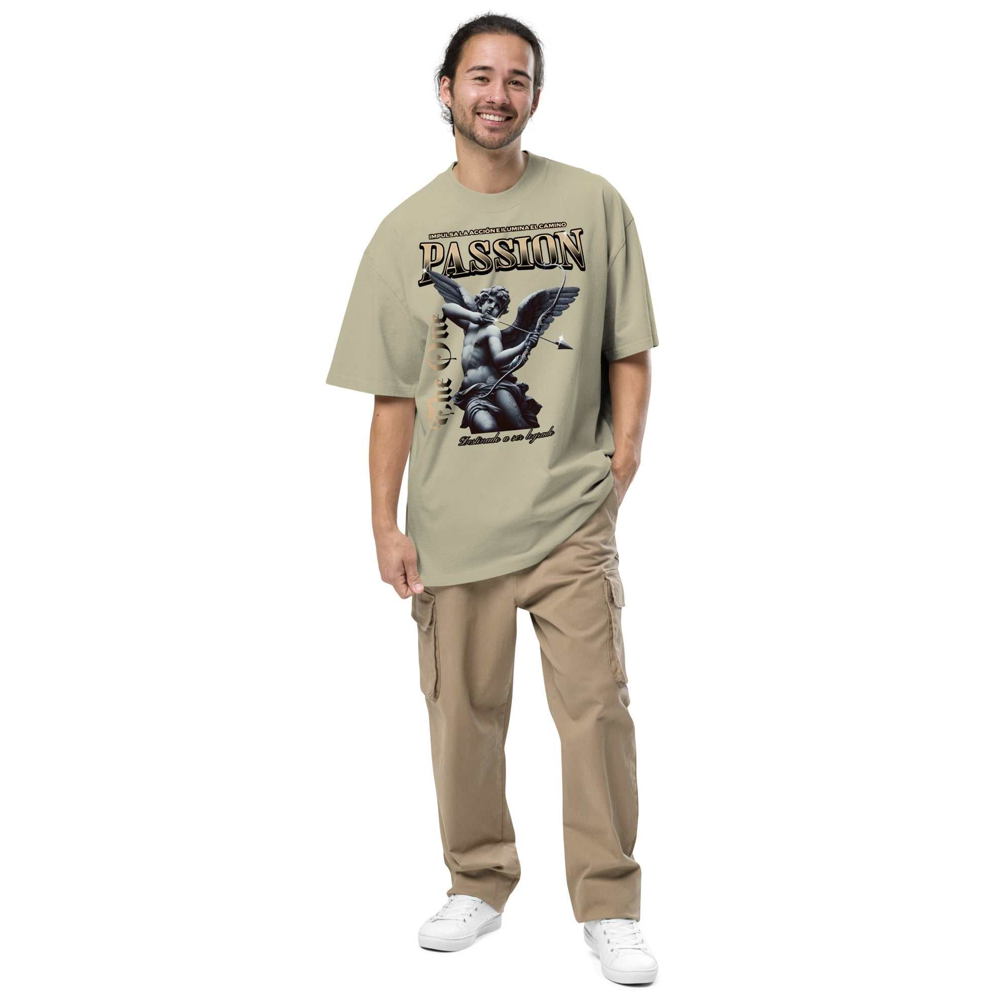 Man wearing Passion Oversized Faded T-Shirt with vintage graphic, beige cargo pants, and white sneakers in casual streetwear style
