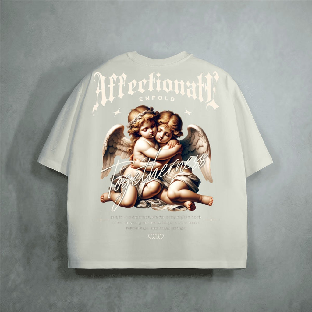 The One PR cream heavyweight 100% combed cotton cropped loose t-shirt with cherub graphic and gothic text.