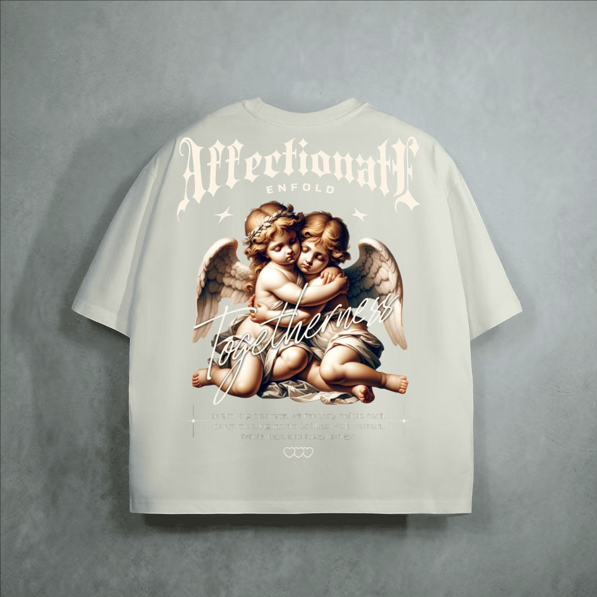 The One PR cream heavyweight 100% combed cotton cropped loose t-shirt with cherub graphic and gothic text.