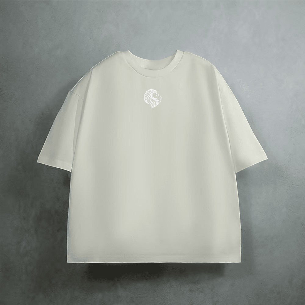 The One PR cream heavyweight cropped loose t-shirt with embroidered lion logo on chest. 100% combed cotton.
