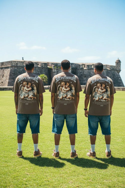 The One PR brown heavyweight cropped loose t-shirt with cherub graphic print on back. 100% combed cotton.
