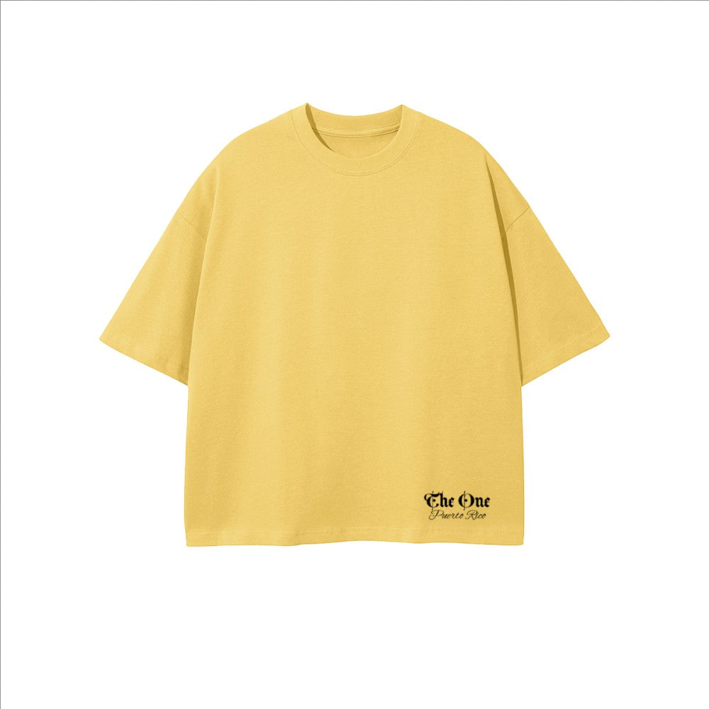 The One PR yellow oversized cropped t-shirt made of 100% combed cotton with a small black logo on the lower right.