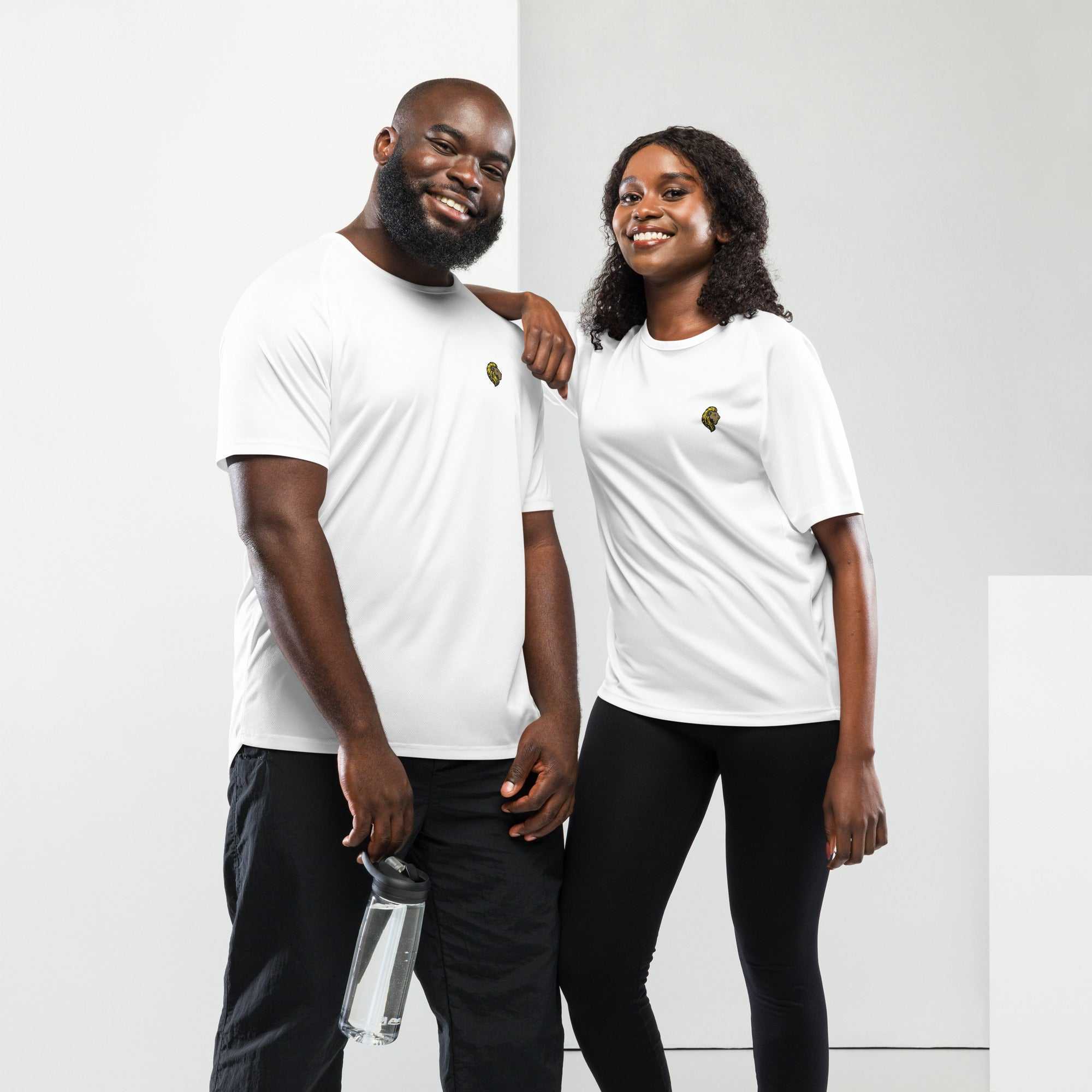 man and woman wearing white unisex sports jersey with black pants standing against white background